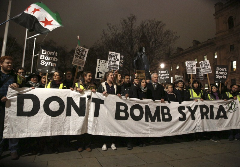 Britain's Parliament votes to launch bombing raids against Islamic State in Syria after more than 10 hours of tense debate. Anti-war protests in London,Anti-war protests,Islamic State,Syria