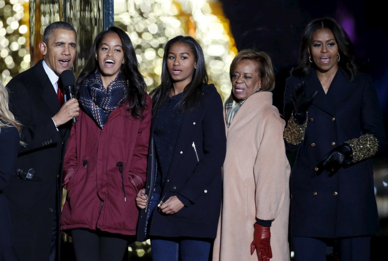 U.S. President Barack Obama and his family led the lighting of the National Christmas Tree, with charity, thanks, and a moment of reflection for the victims of Wednesday's shooting. Barack Obama,Barack Obama lights Christmas tree,Obama lights Christmas tree,Obama hugs Santa Claus,Christmas Tree Lighting,Obama
