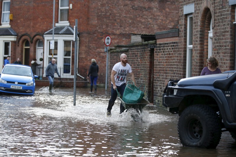 Flooding in northwest England has left thousands of homes without power. Storm Desmond hits Britain,floods in Britain,Britain floods,Britain heavy rain,Storm Desmond