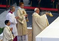 Tens of thousands of Catholic pilgrims assembled in Rome Tuesday to watch Pope Francis open a 