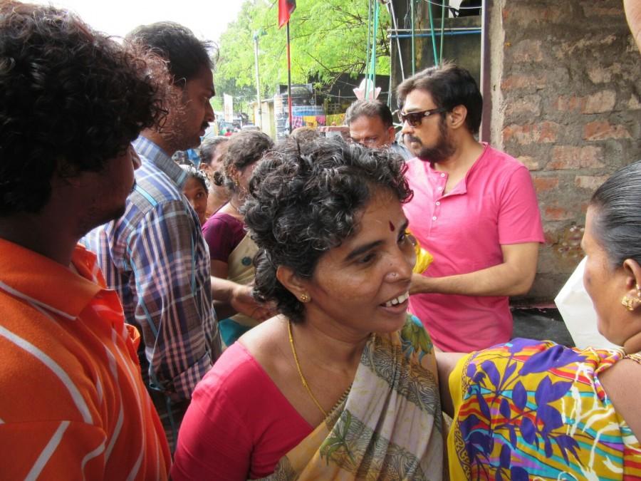 Tamil actor Mohan helped many villagers, who were affected by the flood in Mylapore area in Chennai. Tamil actor Mohan,Tamil actor Mohan helps chennai people,chennai floods,chennai rains,Celebs help chennaites