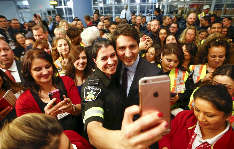 The first plane load of Syrian refugees arrived in Toronto on a military aircraft. Canada Welcomes Syrian Refugees,Syrian Refugees,Canada prime minister,Canada prime minister welcomes wave of Syrian refugees,Justin Trudeau