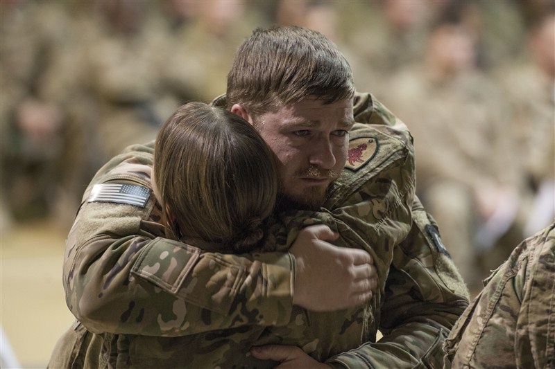 Fellow troops mourn for six U.S. service members killed by a suicide bomber near Bagram air base in Afghanistan. Mourning in Bagram,Bagram air base,Afghanistan,Bagram Air Field,Bagram ataack