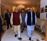 Indian Prime Minister Narendra Modi arrived here on Friday evening on a surprise visit from Kabul for talks with his Pakistani counterpart Nawaz Sharif.