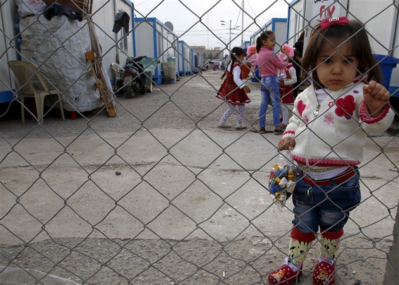 Santa Claus pays a visit to poor families and Christians fleeing Islamic State in the Baghdad area. Christmas celebration in Iraq,Christmas celebration,Christmas celebration in Islamic State,Santa Claus,Baghdad area,Islamic State