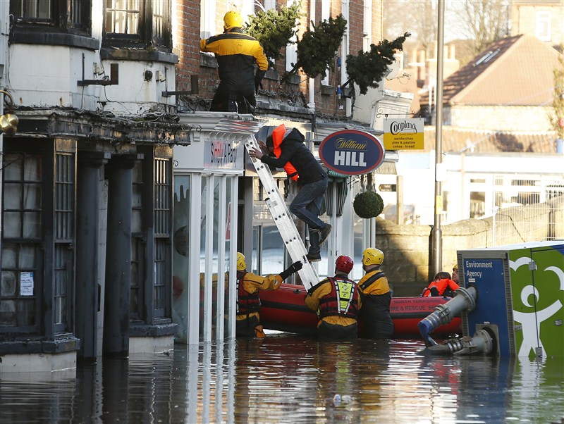 British soldiers helped evacuate hundreds of people from rising floodwaters in the historic city of York, after heavy rainfall inundated towns and cities across northern England. Flooding hits England,UK floods,floods,floodwaters,heavy rainfall,northern England
