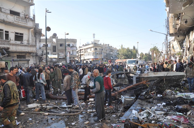 At least 32 people were killed and 90 others were injured as twin bombings rocked Syria's Al-Zahra' district of Homs city, said the Syrian Observatory for Human Rights, a UK-based watchdog. Syria bombings,twin bombings,Syria twin bombings,Homs city,32 people killed,32 people killed in Syria bombings,Al-Zahra