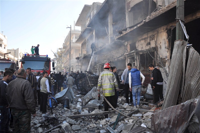 At least 32 people were killed and 90 others were injured as twin bombings rocked Syria's Al-Zahra' district of Homs city, said the Syrian Observatory for Human Rights, a UK-based watchdog. Syria bombings,twin bombings,Syria twin bombings,Homs city,32 people killed,32 people killed in Syria bombings,Al-Zahra