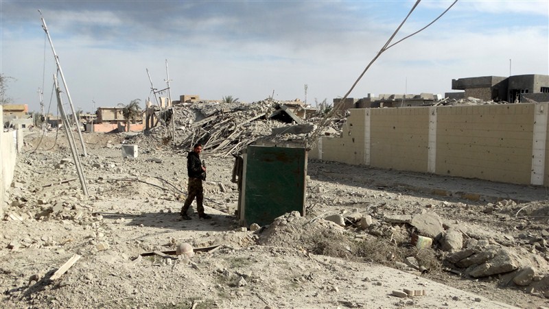 Iraq flies its flag above Ramadi's government complex, marking its military's first major victory since fleeing from Islamic State 18 months ago. Ramadi liberated from Islamic State,Ramadi,Islamic State,Iraq,Iraq flies flag,iraq victory,ISIS,ISIS loses