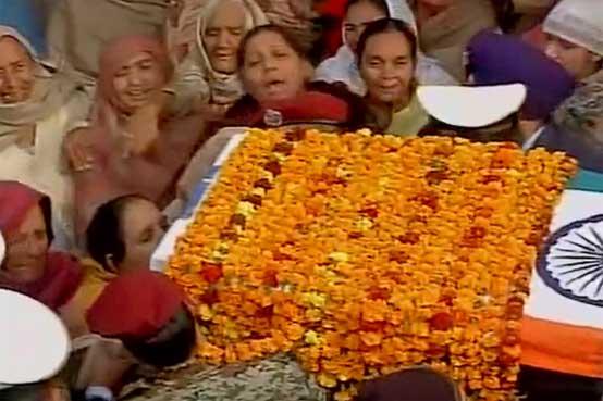 The family members of martyred Garud Commando Gursewak Singh burst into tears after seeing the mortal remains of the brave soldier in Ambala. Pathankot Terror Attack,Garud Commando Gursewak Singh,Gursewak Singh,Gursewak Singh's Last rites,Pathankot Attack,Terror attack in Pathankot