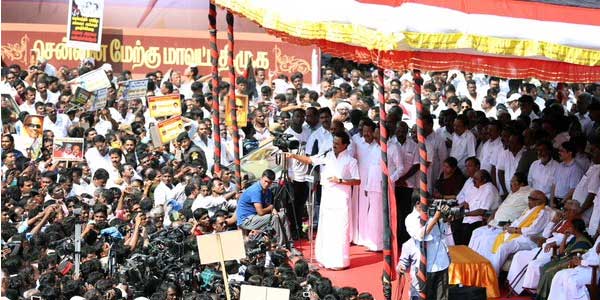 DMK activists held a protest demonstration here on Tuesday and demanded a judicial inquiry into the release of surplus water from Chembarambakkam lake here and subsequent flooding in the city. DMK protest against AIADMK,DMK,AIADMK,rain situation,chennai floods,Chembarambakkam lake,Karunanidhi