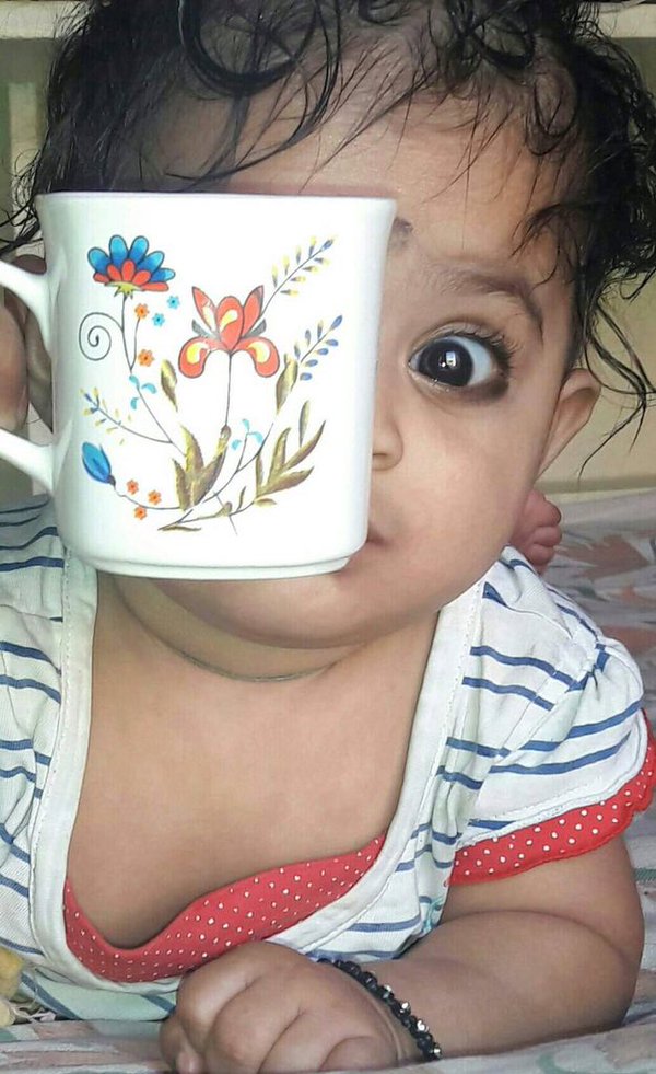 Sandalwood Actor Shivaraj Kumar's style on the poster of Shivaraj Kumar,Killing Veerappan,Coffee mug pose,Tea mug photo,Shivaraj kumar holding coffee mug,Ram Gopal Varma,funny selfies,funny Selfie
