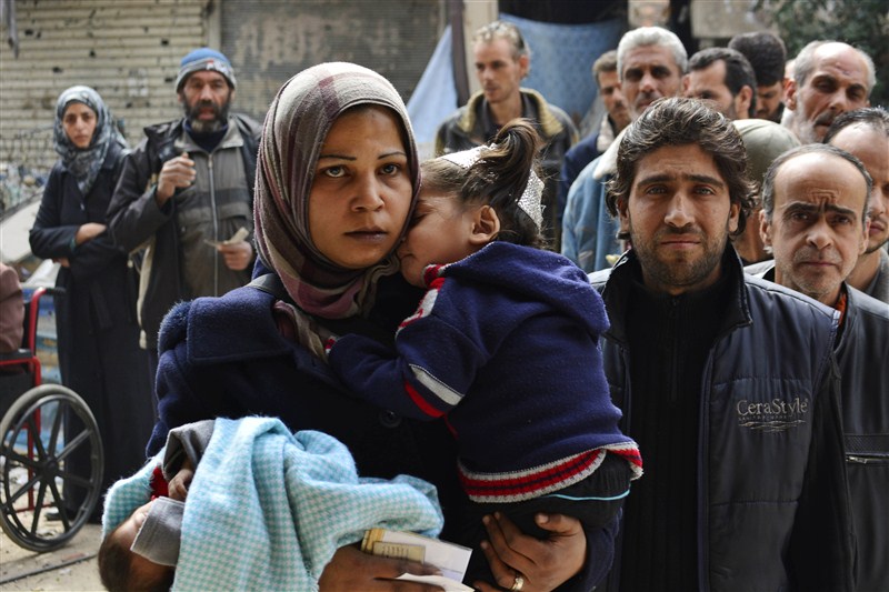 Civilians face starvation, army sieges and displacement in Syria's ongoing war. Syria's humanitarian crisis,Syria,humanitarian crisis,syrian refugees,Civilians face starvation