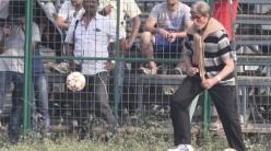 Bollywood superstar Amitabh Bachchan on Tuesday took time off to play some football with the kids at the Mohammedan Sporting ground where he had gone for a film shoot.