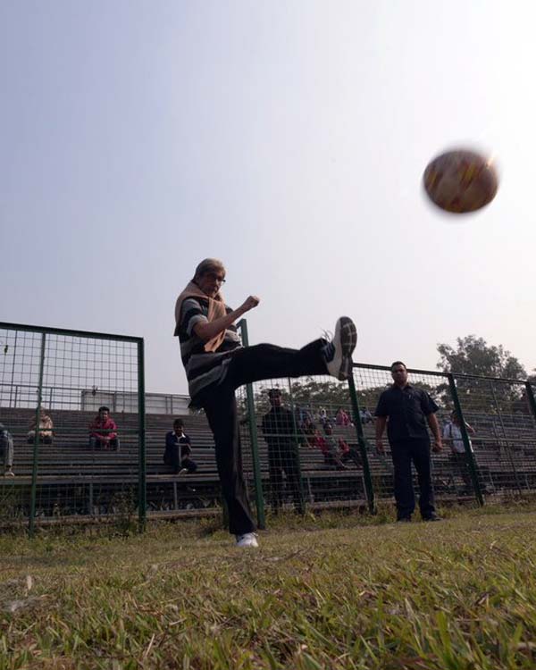 Bollywood superstar Amitabh Bachchan on Tuesday took time off to play some football with the kids at the Mohammedan Sporting ground where he had gone for a film shoot. Amitabh Bachchan,Amitabh Bachchan plays football,Amitabh Bachchan plays football with kids,actor Amitabh Bachchan,Mohammedan Sporting ground,Bollywood superstar Amitabh Bachchan,Big B