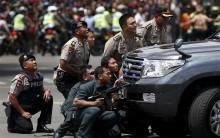 Several explosions went off and gunfire broke out in the center of the Indonesian capital on Thursday and police said they suspected a suicide bomber was responsible for at least one the blasts.