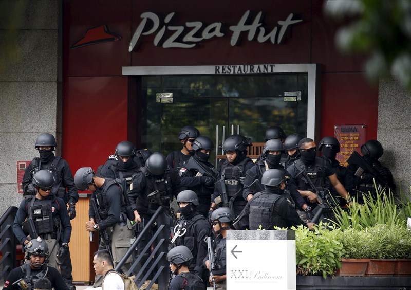 Several explosions went off and gunfire broke out in the center of the Indonesian capital on Thursday and police said they suspected a suicide bomber was responsible for at least one the blasts. Bombs at Indonesian capital,gunfire at Indonesian capital,Bombs and gunfire rock Indonesian capital,explosions,Jakarta attacks,gunfire,suicide bomber