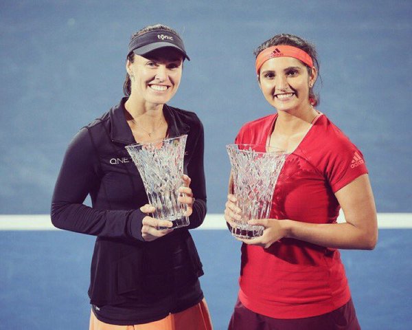 Indo-Swiss pair Sania Mirza and Martina Hingis lift Sydney International women's doubles title. Sania Mirza,Martina Hingis,Sania Mirza and Martina Hingis,Sydney International women's doubles title,Indo-Swiss pair,Indo-Swiss,women's doubles title,women's doubles,Tennis
