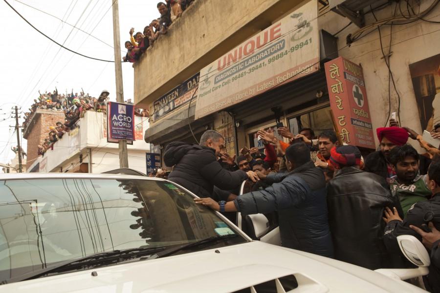 Dangal is a film based on the life of Haryana-based wrestler Mahavir Singh Phogat. Fans crowd Aamir Khan,Aamir Khan's Dangal sets,Aamir Khan,Dangal sets,Fans crowd Aamir Khan's Dangal sets,Dangal working stills,Dangal working pics,Dangal working images,Dangal working photos,Dangal working pictures