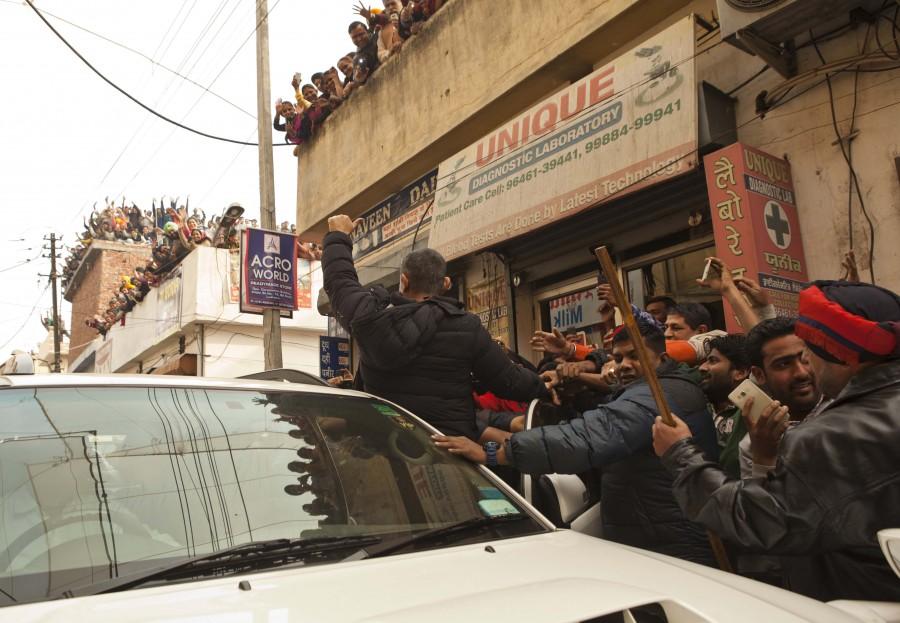Dangal is a film based on the life of Haryana-based wrestler Mahavir Singh Phogat. Fans crowd Aamir Khan,Aamir Khan's Dangal sets,Aamir Khan,Dangal sets,Fans crowd Aamir Khan's Dangal sets,Dangal working stills,Dangal working pics,Dangal working images,Dangal working photos,Dangal working pictures