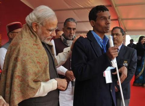 Prime Minister Narendra Modi on Friday set a record of sorts by distributing 15,746 special aid equipment to 9,296 differently-abled people here.