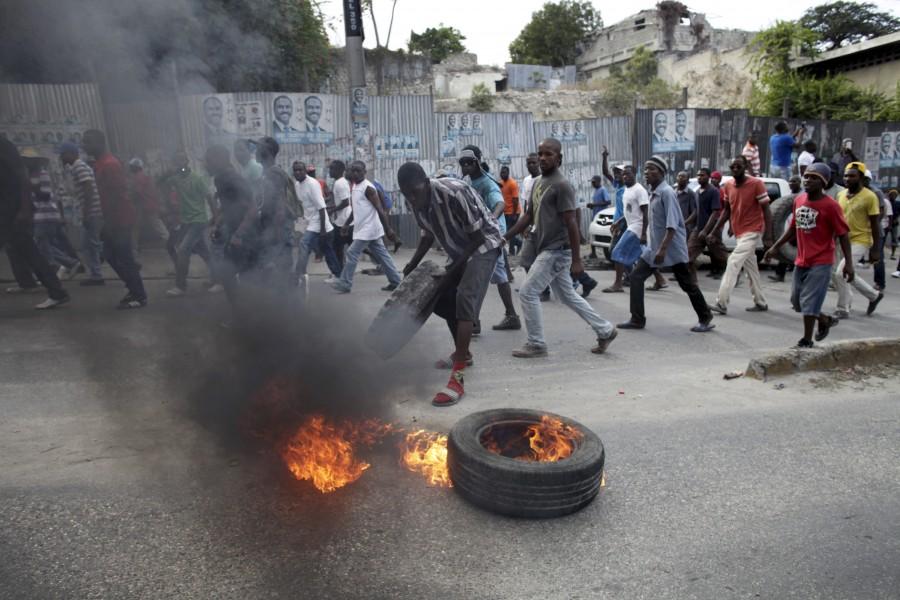 Haiti called off its presidential election on Friday, two days before it was due, over concerns of escalating violence. Haiti,presidential election,violence erupts,violence,Haiti violence,Pierre Louis Opont,Haiti's electoral council