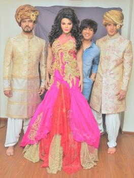 Bollywood actress Rakhi Sawant and Australian Model Avadhoot Nichkawde launch Designer Rohit Verma's collection.