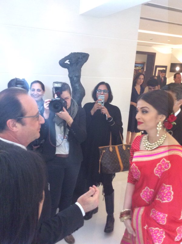 Actress Aishwarya Rai Bachchan has chosen an elegant look in a red designer Banarasi silk sari to wear for a special lunch with French President Francois Hollande on Tuesday. Aishwarya Rai Bachchan,Aishwarya Rai,Aishwarya Rai Bachchan at Hollande Lunch,Hollande Lunch,French President Francois Holland,Aishwarya looks ravishing in red sari for Hollande lunch,Aishwarya in red sari,Actress Aishwarya Rai Bachchan,Aishwarya Rai new