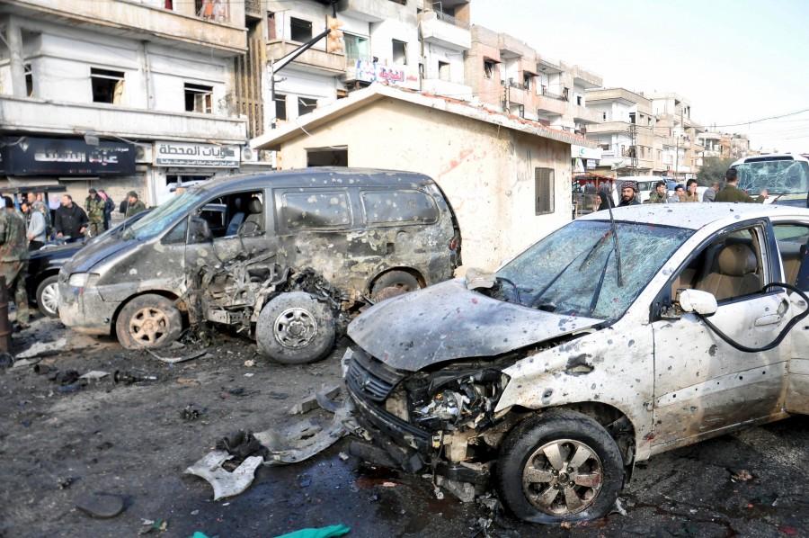 At least 16 people were killed and dozens wounded on Saturday in the central Syrian city of Homs Two bombings rock Syria,Syria,blast in Syria,twin blast in Syria,car-bomb,Syria's central city of Homs,Homs,pro-government district,al-Zahra,Takfiri Daesh terrorist group,Takfiri Daesh