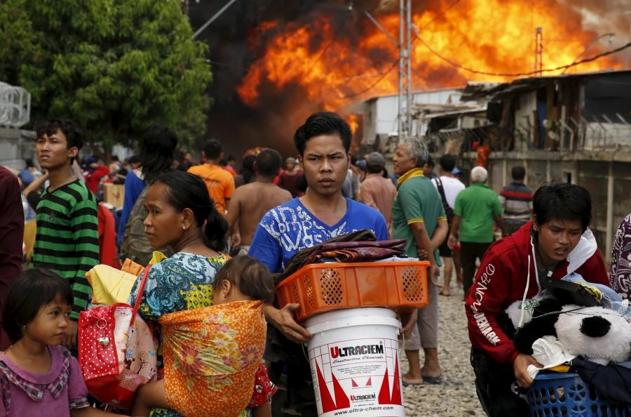 Photos of Fire Rages over Residential Area in Kampung Bandan. Kampung Bandan,Fire at Kampung Bandan,100 wooden dwellings,Indonesia,Residential Area in Kampung Bandan