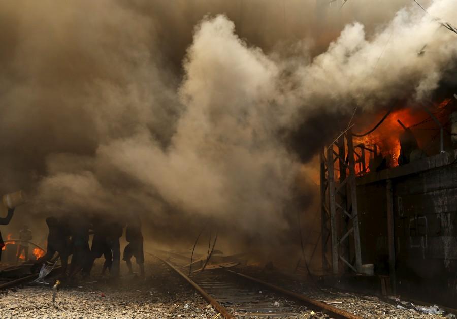Photos of Fire Rages over Residential Area in Kampung Bandan. Kampung Bandan,Fire at Kampung Bandan,100 wooden dwellings,Indonesia,Residential Area in Kampung Bandan