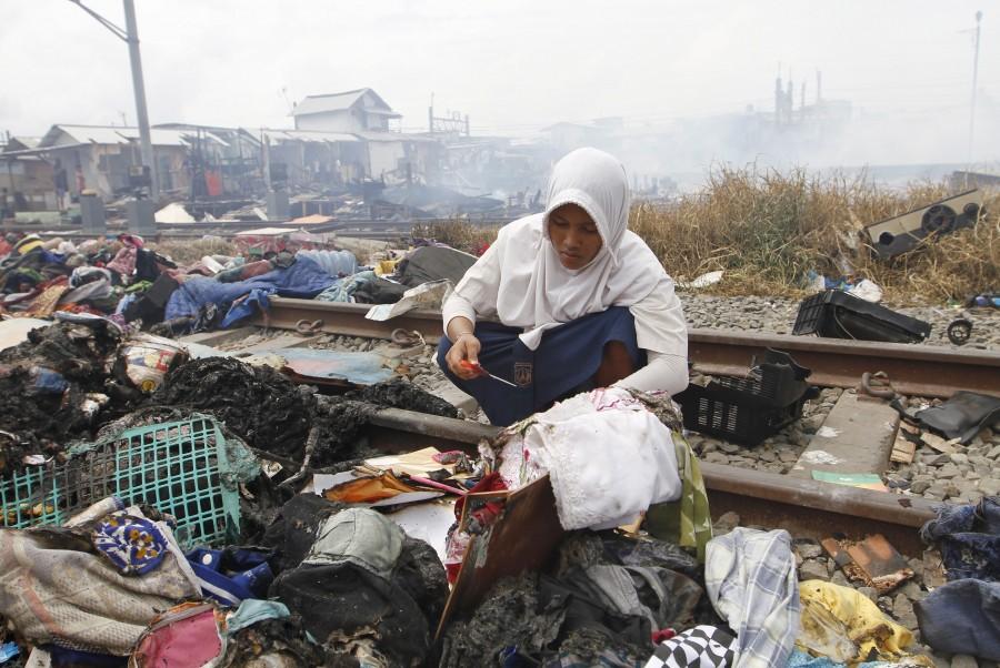 Photos of Fire Rages over Residential Area in Kampung Bandan. Kampung Bandan,Fire at Kampung Bandan,100 wooden dwellings,Indonesia,Residential Area in Kampung Bandan