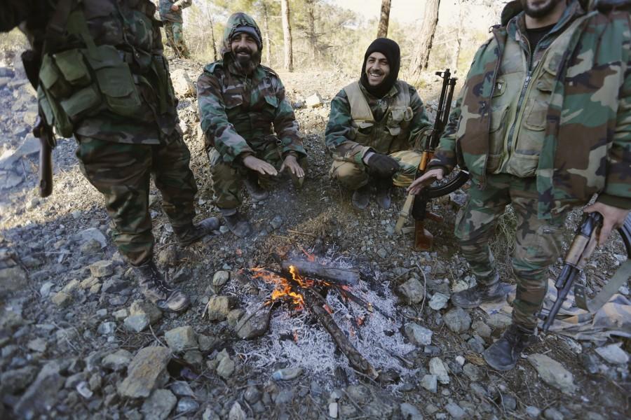 Syrian pro-government forces recapture the rebel-held town of Rabiya, building on battlefield advances in the area ahead of planned peace talks. Syria,Syrian pro-governmen,Rabiya,rebel fighters,Assad forces,Rabiya building