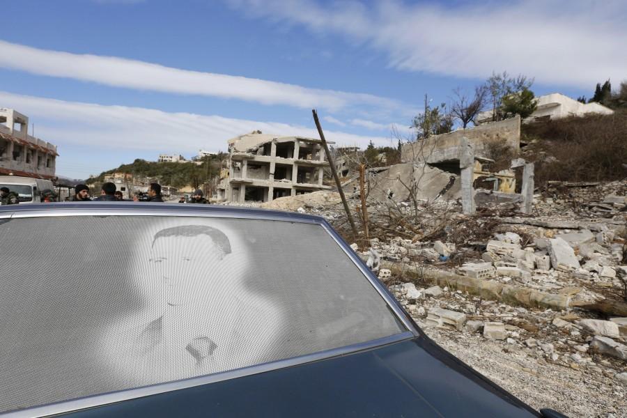 Syrian pro-government forces recapture the rebel-held town of Rabiya, building on battlefield advances in the area ahead of planned peace talks. Syria,Syrian pro-governmen,Rabiya,rebel fighters,Assad forces,Rabiya building