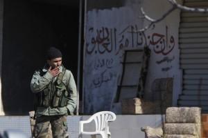 Syria,Syrian pro-governmen,Rabiya,rebel fighters,Assad forces,Rabiya building