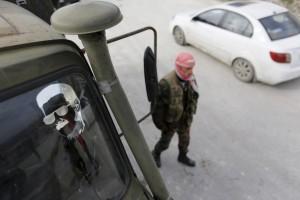 Syria,Syrian pro-governmen,Rabiya,rebel fighters,Assad forces,Rabiya building