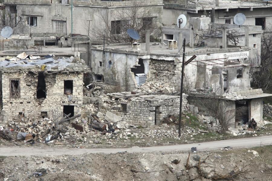 Syrian pro-government forces recapture the rebel-held town of Rabiya, building on battlefield advances in the area ahead of planned peace talks. Syria,Syrian pro-governmen,Rabiya,rebel fighters,Assad forces,Rabiya building
