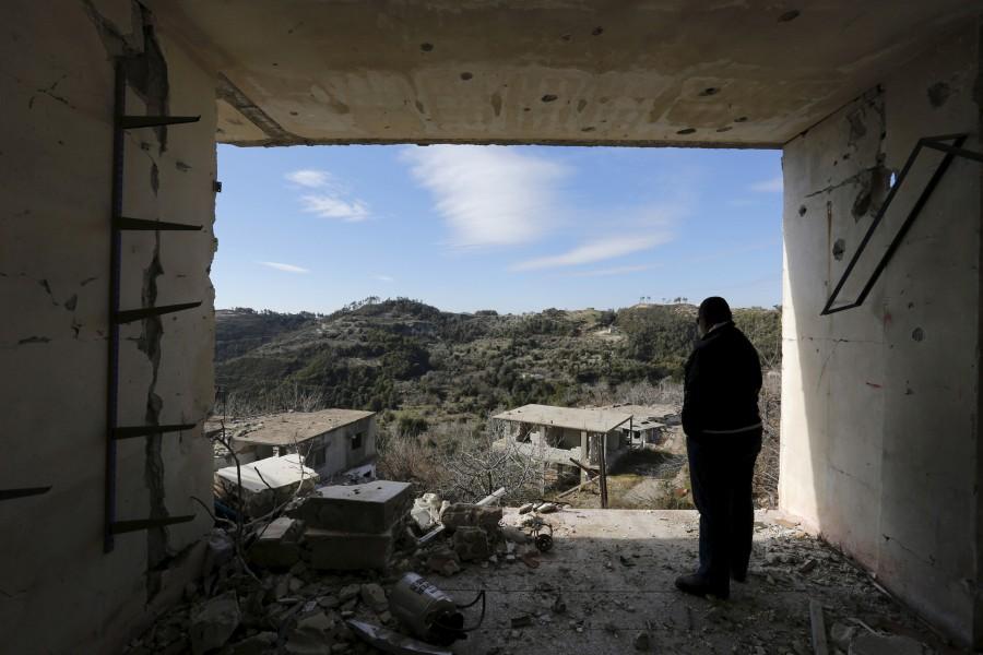 Syrian pro-government forces recapture the rebel-held town of Rabiya, building on battlefield advances in the area ahead of planned peace talks. Syria,Syrian pro-governmen,Rabiya,rebel fighters,Assad forces,Rabiya building