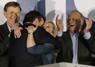 Arch conservative Ted Cruz, a Tea Party favourite, scored an upset victory over Republican frontrunner Donald Trump, while Democrats Hillary Clinton and Bernie Sanders were locked in a virtual tie in the nation's first presidential race.