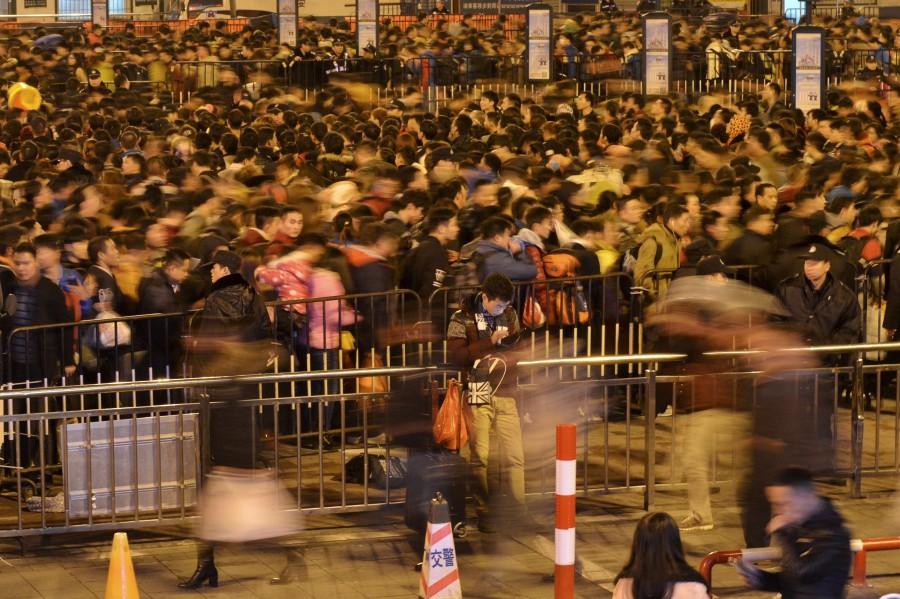 More than 50,000 passengers were stranded at China's Guangzhou railway station. 50,000 passengers,China railway station,Guangzhou railway station,Guangzhou,50000 passengers,China's Guangzhou railway station