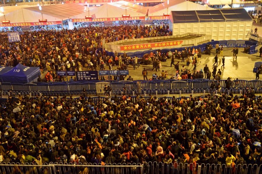 More than 50,000 passengers were stranded at China's Guangzhou railway station. 50,000 passengers,China railway station,Guangzhou railway station,Guangzhou,50000 passengers,China's Guangzhou railway station