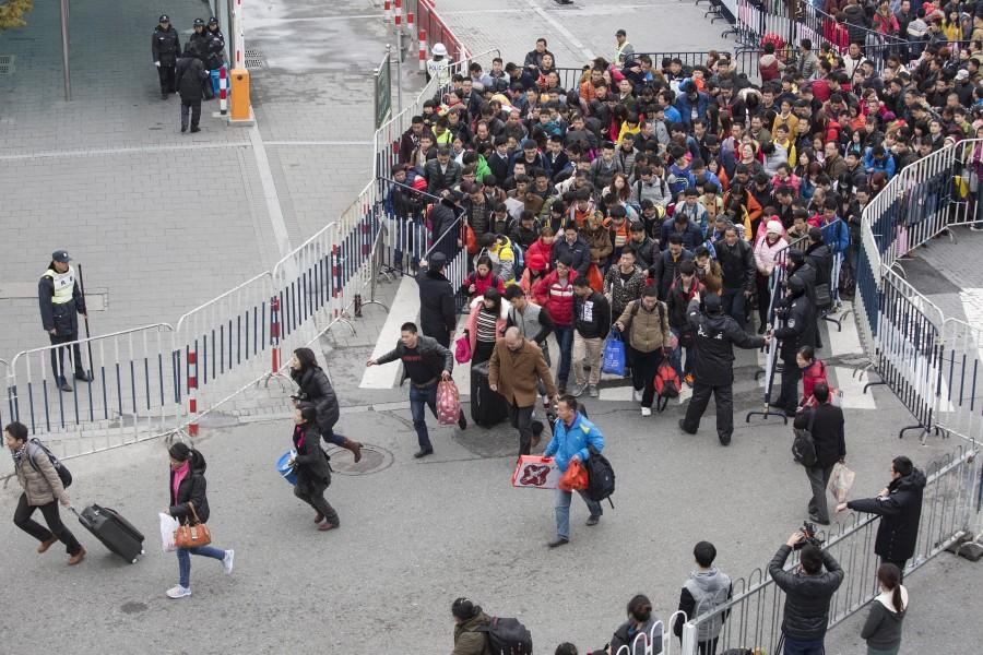 More than 50,000 passengers were stranded at China's Guangzhou railway station. 50,000 passengers,China railway station,Guangzhou railway station,Guangzhou,50000 passengers,China's Guangzhou railway station