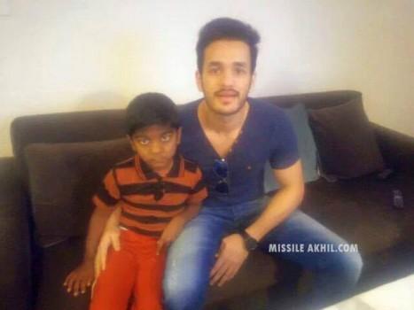 Tollywood actor Akkineni Akhil drives passenger auto-rickshaw in Khammam on Tuesday and donated earnings to the help of 6 years old boy Ashwith Reddy who is suffering from Kidney related disease.