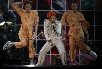 Singer Lady Gaga remembered late singer David Bowie with a sprawling tribute, while performing a medley of his hit songs at the 58th annual Grammy Awards.