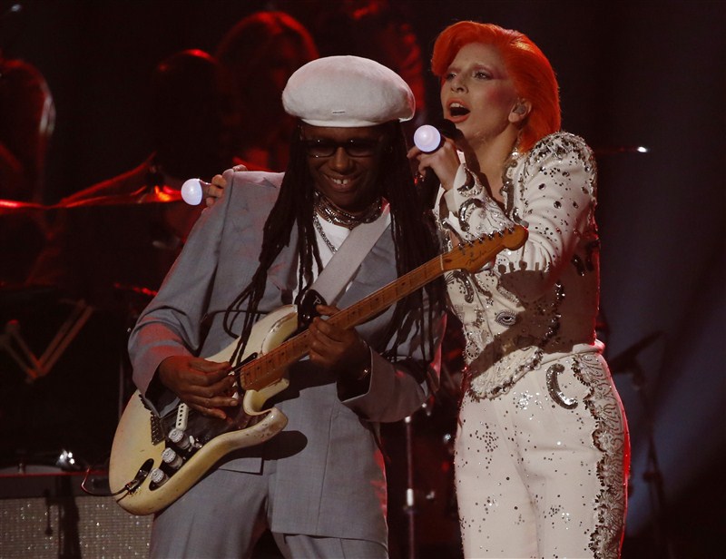Singer Lady Gaga remembered late singer David Bowie with a sprawling tribute, while performing a medley of his hit songs at the 58th annual Grammy Awards. Lady Gaga,singer Lady Gaga,Lady Gaga pays tribute to David Bowie at Grammy Awards,Lady Gaga pays tribute to David Bowie,David Bowie,tribute to David Bowie,Grammy Awards,Grammy Awards 2016,58th Grammy Awards,Grammy Awards pics,Grammy Awards images,Grammy A