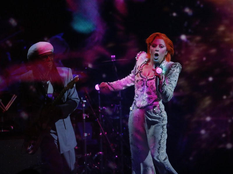Singer Lady Gaga remembered late singer David Bowie with a sprawling tribute, while performing a medley of his hit songs at the 58th annual Grammy Awards. Lady Gaga,singer Lady Gaga,Lady Gaga pays tribute to David Bowie at Grammy Awards,Lady Gaga pays tribute to David Bowie,David Bowie,tribute to David Bowie,Grammy Awards,Grammy Awards 2016,58th Grammy Awards,Grammy Awards pics,Grammy Awards images,Grammy A