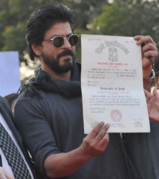 Superstar Shah Rukh Khan on Tuesday returned to his alma mater, Delhi University's Hansraj College, to finally receive his graduation degree after 28 years.