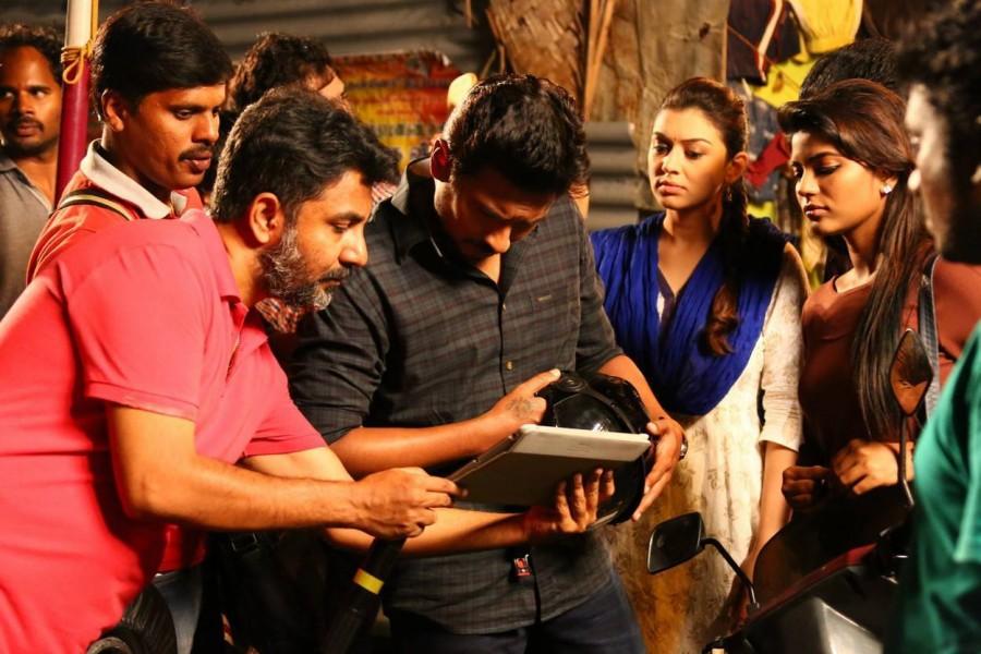 Udhayanidhi Stalin and Hansika Motwani's Manithan Working Stills. Manithan,Udhayanidhi Stalin,Hansika Motwani,Manithan Working Stills,Manithan Working pics,Manithan Working images,Manithan Working stills,Manithan movie Stills,Manithan movie pics,Manithan movie images,Manithan movie pictures