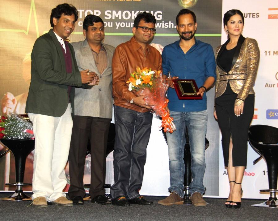 Bollywood actress Sunny Leone, Deepak Dobriyal at the launch of Anti-Smoking Ad. Sunny Leone,Deepak Dobriyal,Sunny Leone at the launch of Anti-Smoking Ad,Anti-Smoking Ad,Sunny Leone Anti-Smoking Ad,Sunny Leone launch Anti-Smoking Ad,actress Sunny Leone,Sunny Leone new pics,Sunny Leone new images,Sunny Leone new stills,Sunny Leone new
