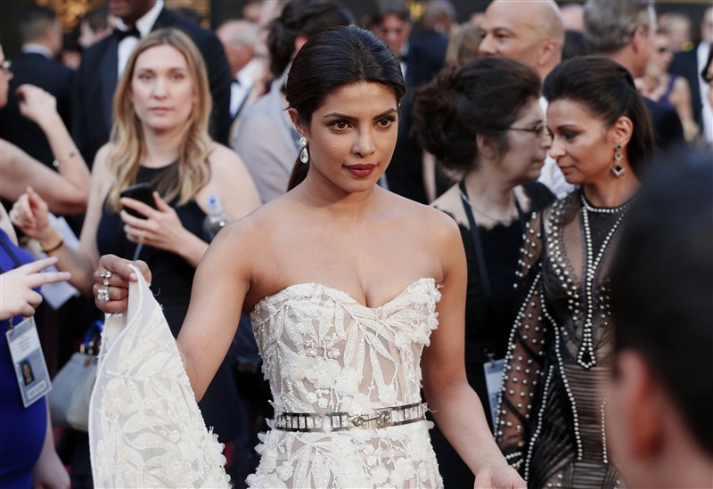 Bollywood actress Priyanka Chopra, who is one of the presenters at 88th Academy Awards, stunned the red carpet in one of the elegant creations designed by Lebanese designer Zuhair Murad. Priyanka Chopra,Priyanka Chopra at Oscars red carpet,Priyanka Chopra at Oscars,Priyanka Chopra at Oscars red carpet in Lebanese designer gown,Priyanka Chopra in Lebanese designer gown,Bollywood actress Priyanka Chopra,actress Priyanka Chopra,88th Academy
